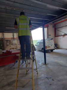 A picture of our fully qualified electrician doing Lighting installation we did for in Cardiff